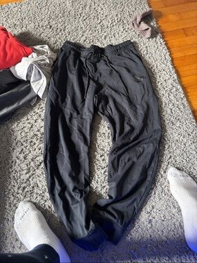 Mens black Nike tech pants